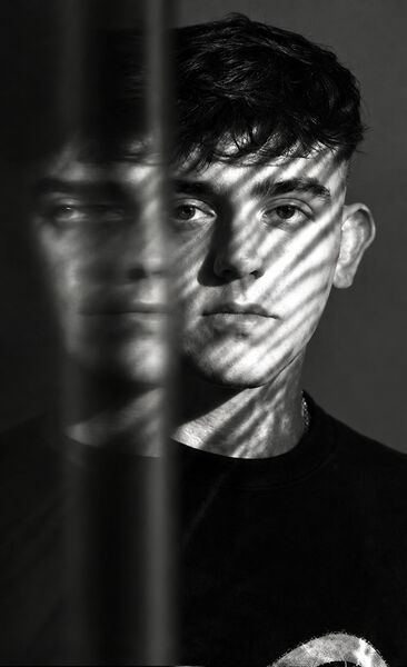 Modeā, black and white double exposure with striped shadows